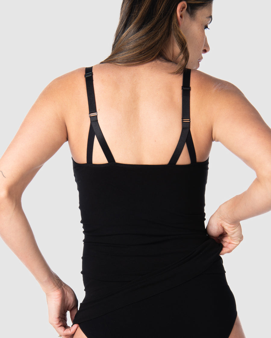 Rear view of the My Necessity Camisole by Hotmilk Lingerie AU in black. This camisole serves as the ideal base layer, featuring a long line design that covers a pregnant belly and offers postpartum comfort and support