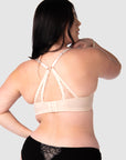 The nursing bra's soft sheer lace straps, delicately hued in shades of pink and featuring the flexibility of a convertible racerback, make it the perfect style to complement any outfit this wedding and party season. Equipped with 6 rows of hooks and eyes, it ensures flexibility throughout your pregnancy and postpartum journey. Hotmilk Lingerie AU offers a nursing bra that harmoniously combines romantic style, flexi underwire support, and the comfort of soft cotton cups like no other