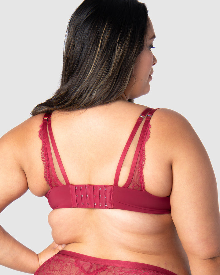 Rear view of a striking maternity bra in vibrant red lace, showcasing dual straps and added space for comfort, specially crafted to embrace and uplift the beauty of pregnancy.