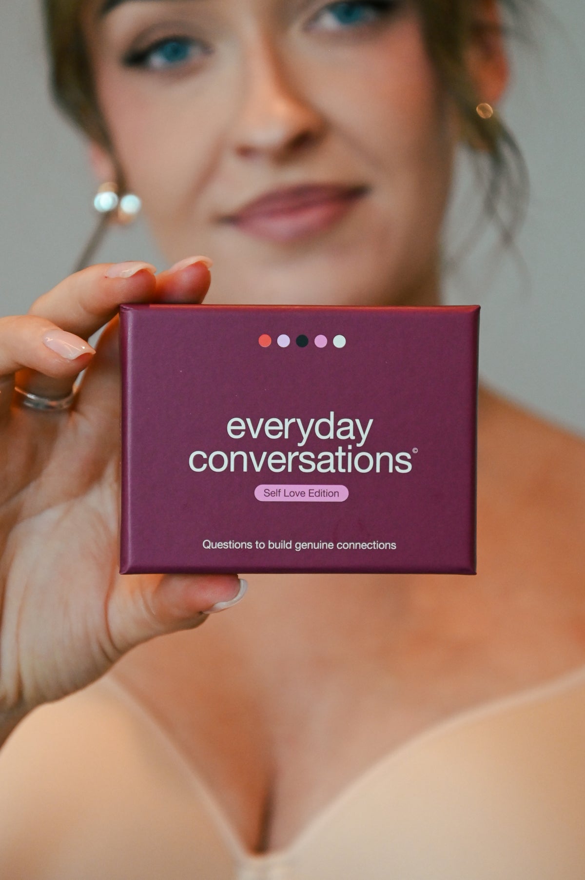 Close-up of Everyday Conversations Self Love Edition card pack, questions to build genuine connections