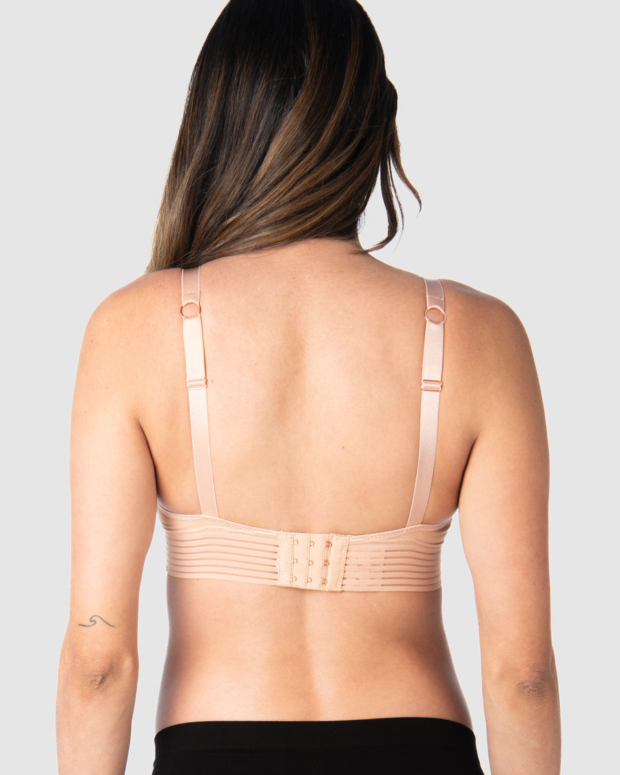 Kami, expecting mother of 2, demonstrating the versatile standard or convertible racerback feature of Hotmilk AU's Ambition T-Shirt Wirefree nursing and maternity bra in shell pink, designed for maternity, nursing, and breastfeeding comfort