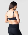 Julia, a mother of one, showcases the ease of Hotmilk Lingerie's Balance Sports Crop Bra nursing traditional brack, alternatively, it can be worn racerback style. Expertly designed for mothers on the go, this bra is perfect for light exercise, yoga, and pilates during both pregnancy and nursing. Elevate your active lifestyle with the seamless combination of functionality and style provided by Hotmilk Lingerie's Balance Sports Crop Bra