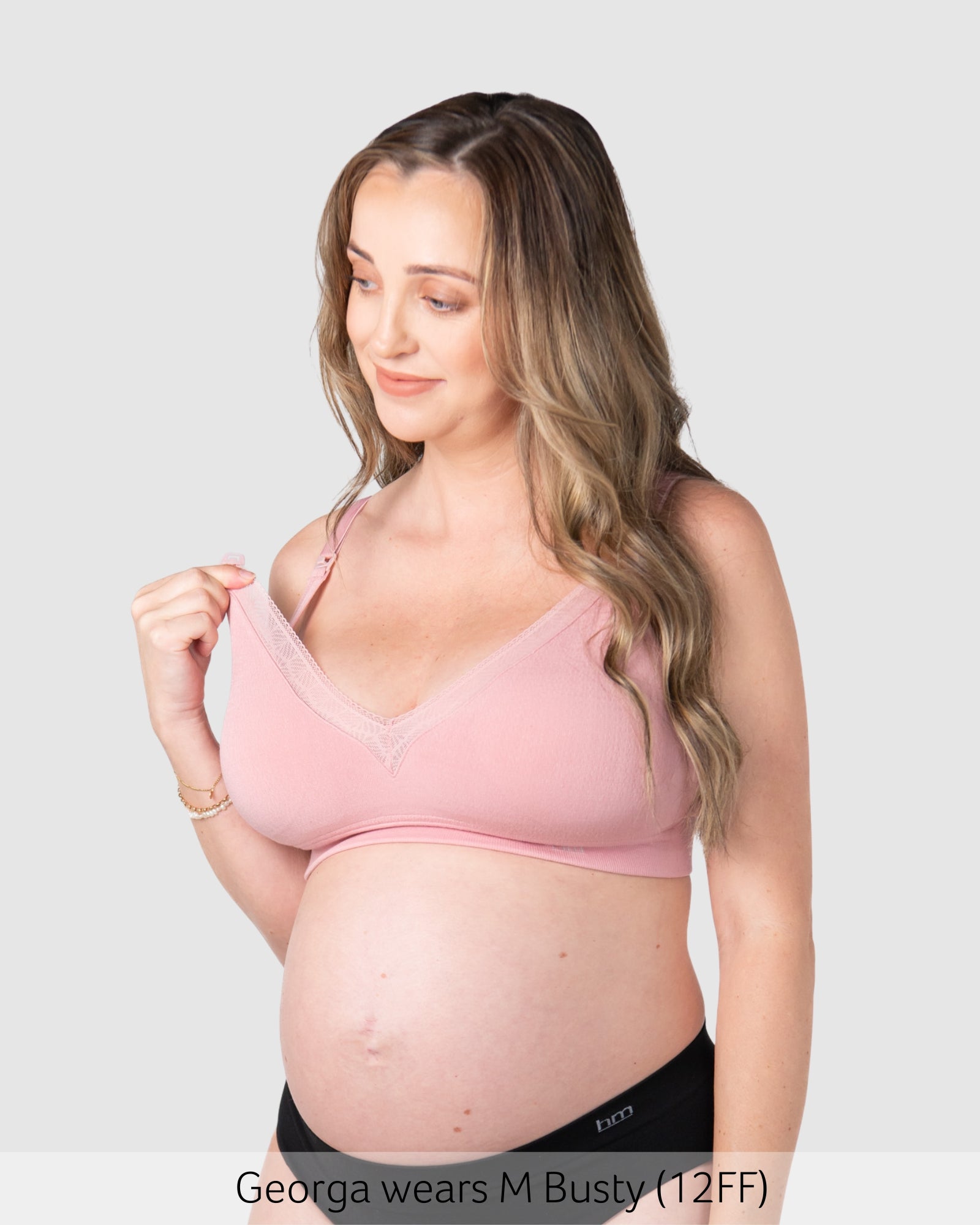 Pregnant woman wearing a hotmilk caress nursing bra by hotmilk