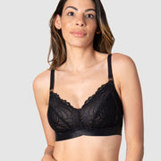 Kami, a mother of two, revels in the comfort and versatile style of Hotmilk Lingerie's Warrior Soft Cup in Black. This wire-free maternity and nursing bra offers the ideal blend of lightness and youthfulness, boasting rose gold magnetic nursing clips and sheer graphic lace for a contemporary touch. Experience comfort and style seamlessly combined in this modern maternity essential