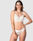 Teaming up with the Warrior Bikini Brief, Hotmilk's Warrior Soft Cup Nursing Bra seamlessly blends luxury, style, and comfort for your breastfeeding journey. Adorned with sheer lace and satin trim, this lush set is the perfect complement to enhance the radiance of a new mama like Kami. Frequently captured in stunning maternity shoots, this Hotmilk Lingerie AU ensemble promises to elevate and support you, making it an indispensable choice for both fashion and function