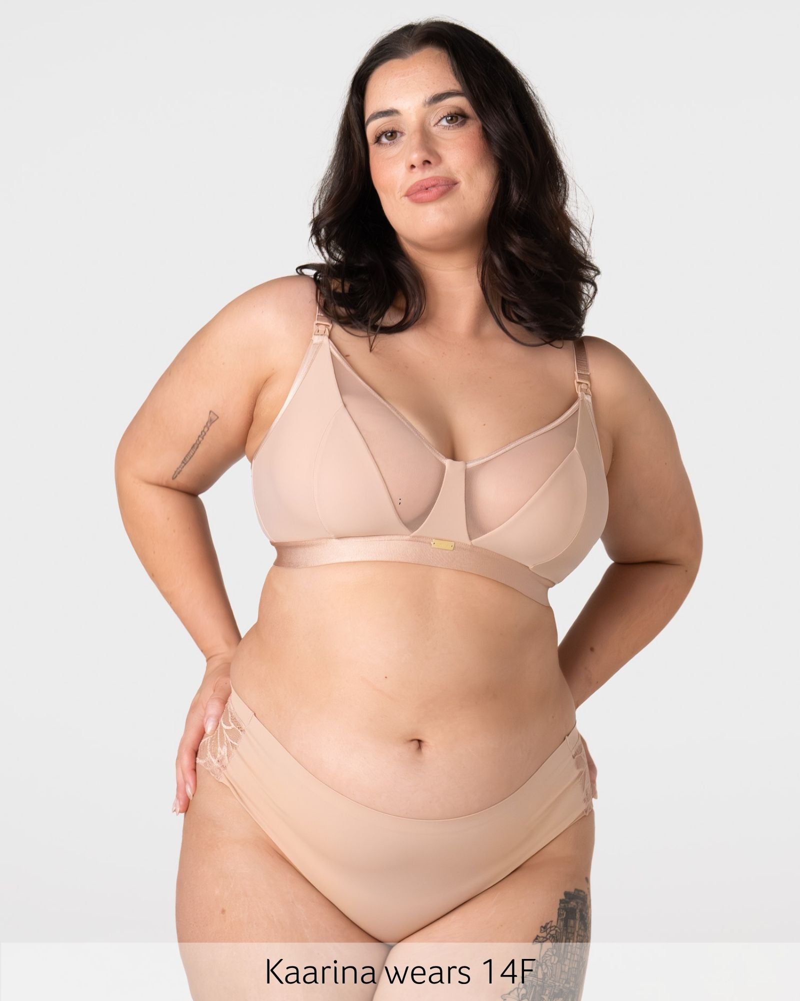 Model wearing the Hotmilk Flawless Plunge Wirefree Nursing Bra in Cashmere with matching briefs – full body front view showing sheer plunge neckline, three-piece cup construction, and gold Hotmilk hardware