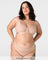Model wearing the Hotmilk Flawless Plunge Wirefree Nursing Bra in Cashmere with matching briefs – full body front view showing sheer plunge neckline, three-piece cup construction, and gold Hotmilk hardware