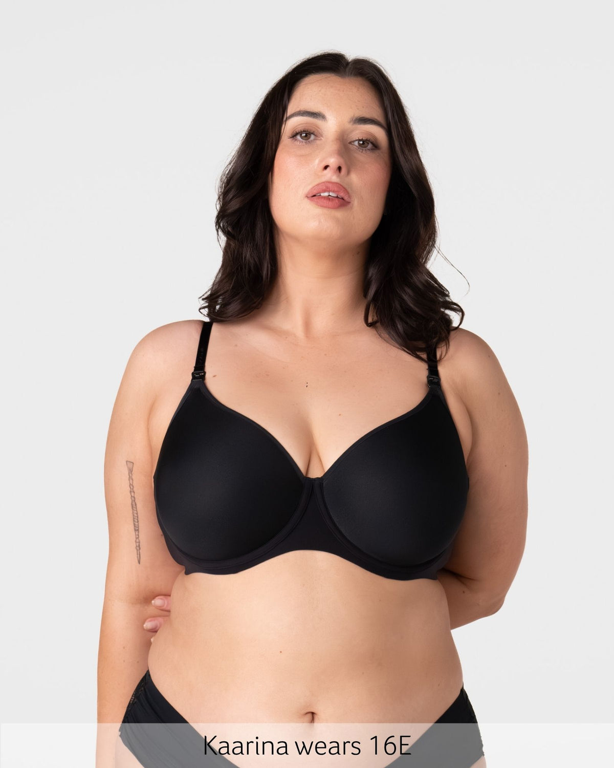 Kaarina wears size 16E in the Forever New black nursing bra with flexiwire support and ¾ coverage contour cups for fuller busts