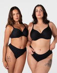 Two women wearing the Hotmilk Forever New black t-shirt nursing bra with smooth contour cups, shown in sizes for small and full busts