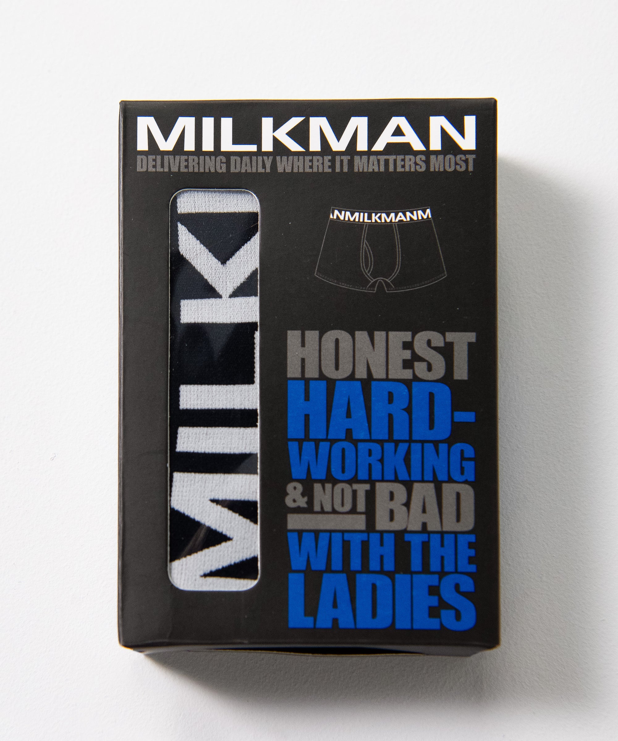 Milkman underwear packaging with humorous text on a white background