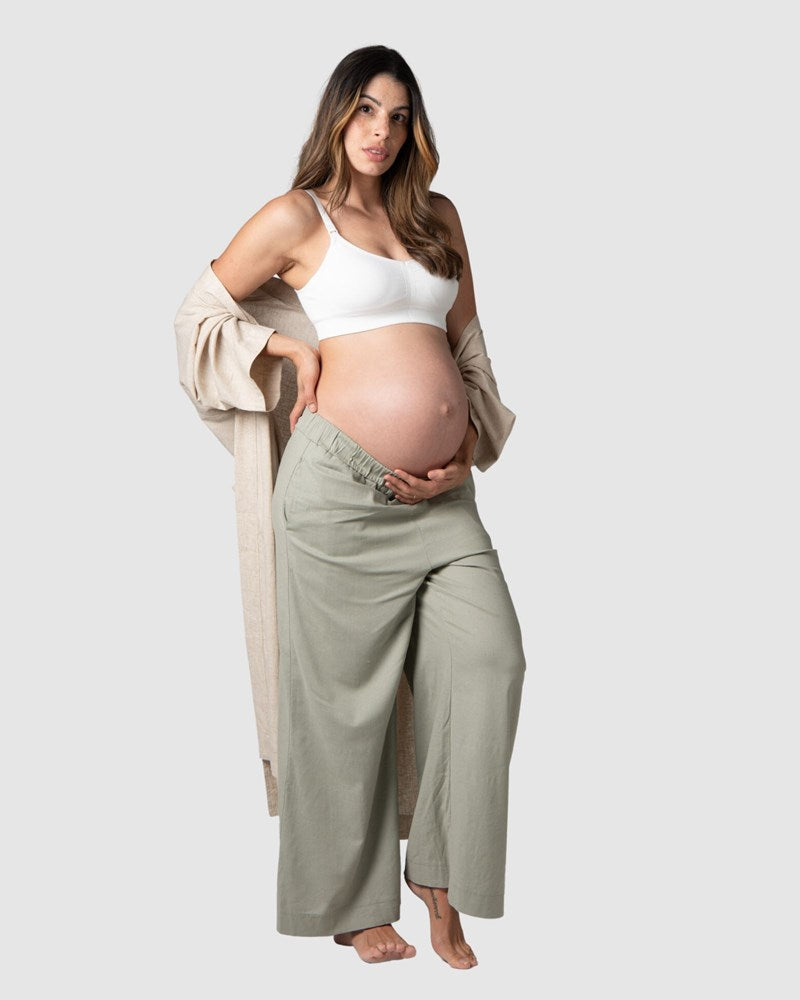 Meet Kami, a mother of 2, proudly showcasing Hotmilk's 'Sage Lounge Pant' paired with the Lounge Robe and My Necessity nursing bra during her 9th month of pregnancy. These pants are the perfect fusion of sumptuous linen, a soft waistband, and a flattering 7/8 length that ensures both style and comfort. Discover the ultimate loungewear for pregnancy and postpartum relaxation with Hotmilk Australia's Sage Lounge Pant