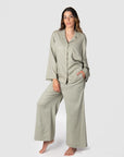Meet Kami, a mother of 2, as she masterfully exemplifies Hotmilk's mix-and-match collection by pairing the Lounge Top with the Lounge Pant. Crafted from a soft linen blend in a serene Sage color, these pieces promise a comfortable fit with stylish 3/4 length kimono-style sleeves. Designed for maternity, breastfeeding, and beyond, Hotmilk's mix-and-match set seamlessly combines fashion and functionality to meet your evolving needs