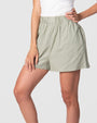 Hotmilk Australia's latest addition to their loungewear collection: the 'Lounge Short in Sage.' Made from a luxurious linen blend, this lounge short not only exudes style but also provides unparalleled comfort. The serene Sage color is an ideal choice for your moments of relaxation. With its soft and stretchy waistband, these shorts are expertly designed to ensure maximum comfort during your leisure time. Elevate your lounging experience with our Sage Lounge Short