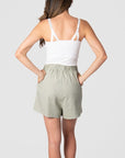 Experience the allure of the Hotmilk 'Sage Lounge Short,' especially when paired with the Hotmilk My Necessity nursing cami to create the ultimate postpartum lounge set. These shorts embody sumptuous comfort, boasting a soft waistband and a flattering above-knee length that seamlessly combines style and relaxation. If you're in pursuit of the perfect loungewear for pregnancy and postpartum comfort, your search ends with Hotmilk Australia's Sage Lounge Short