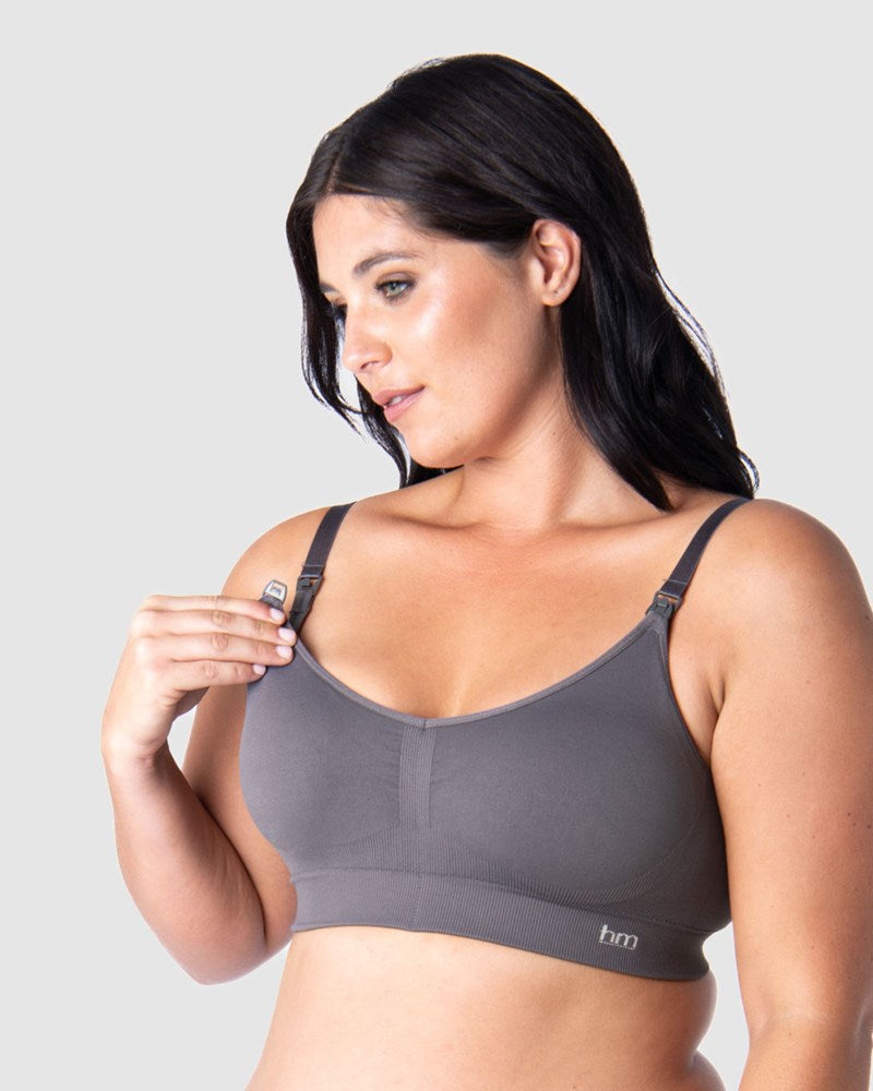 Discover Seamless Comfort and Unmatched Support as Olivia Demonstrates Traditional Nursing Clips on Hotmilk Lingerie's Multifit Nursing Bra. Elevate Your Maternity Experience with this Essential Blend of Style and Function