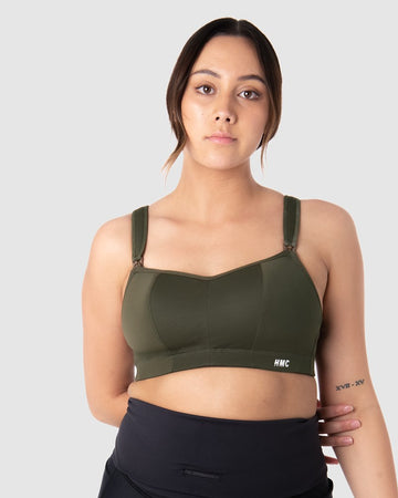 Tatiana, a mother of one, exudes confidence while donning the Zen Olive Wirefree Sports Bra by Hotmilk Lingerie. This versatile bra is an ideal choice for expectant mothers and nursing mothers, providing the perfect support for walking and gentle exercise during pregnancy and breastfeeding