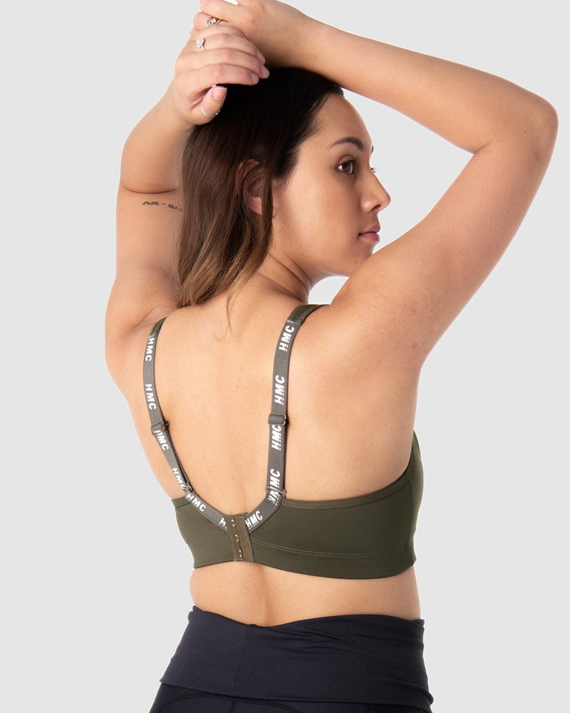 Explore the adaptable back straps in their standard position with the Zen Olive Wirefree Sports Bra from Hotmilk Lingerie. A go-to selection for expectant and nursing mothers, this versatile bra delivers exceptional support for walking and light exercise during pregnancy and throughout the breastfeeding journey